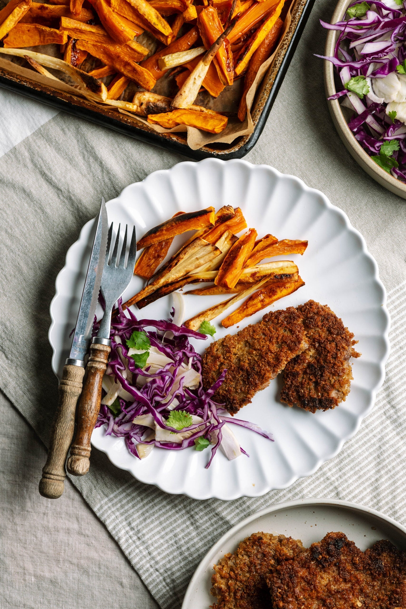 Herb Crusted Beef Schnitzel with Veg Chips and Slaw