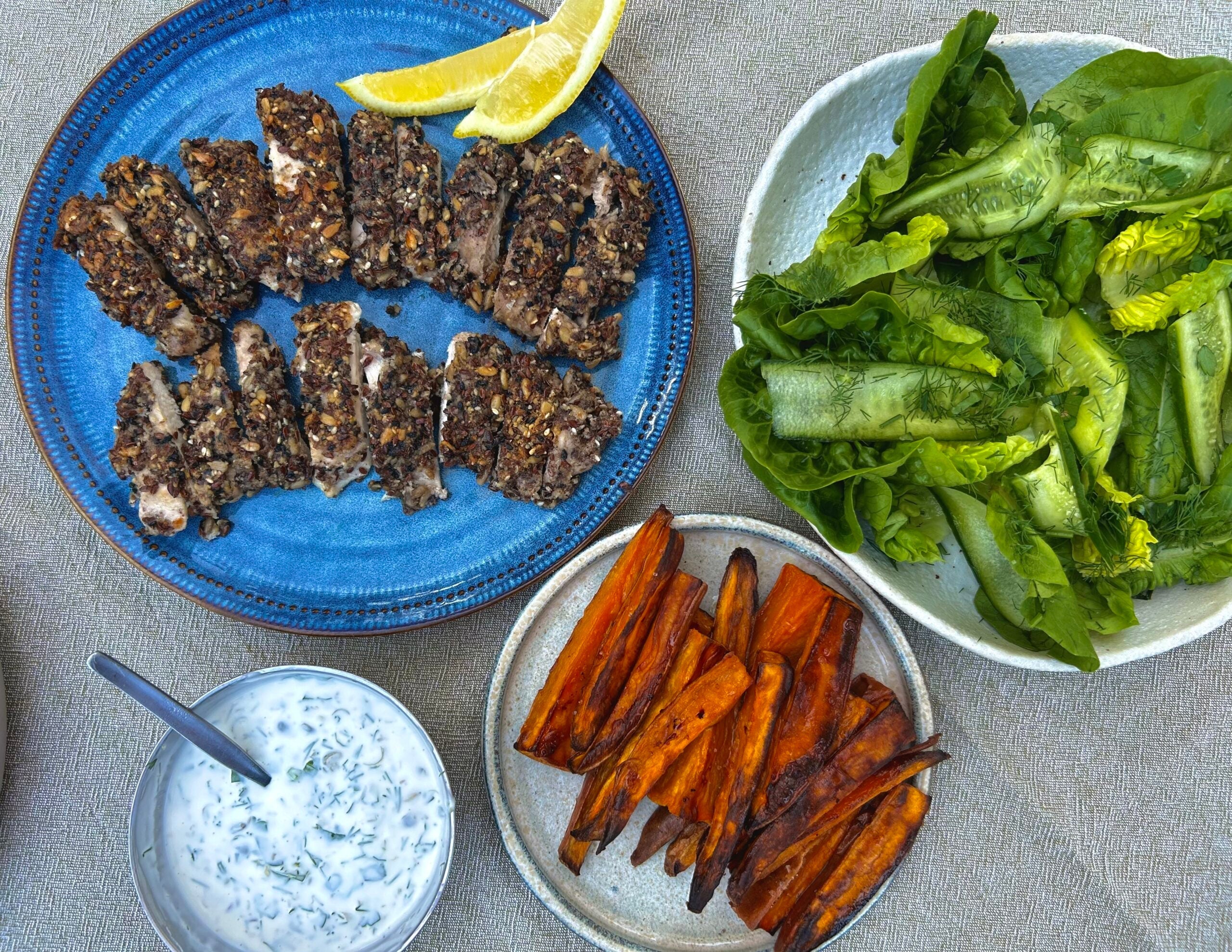 Seed crusted chicken schnitzel and sweet potato chips