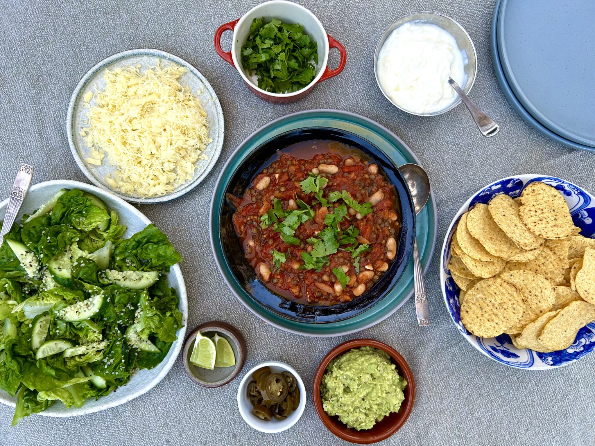 GF nachos with certified GF corn tortilla chips guacamole halal beef and all toppings for party crowd favorite